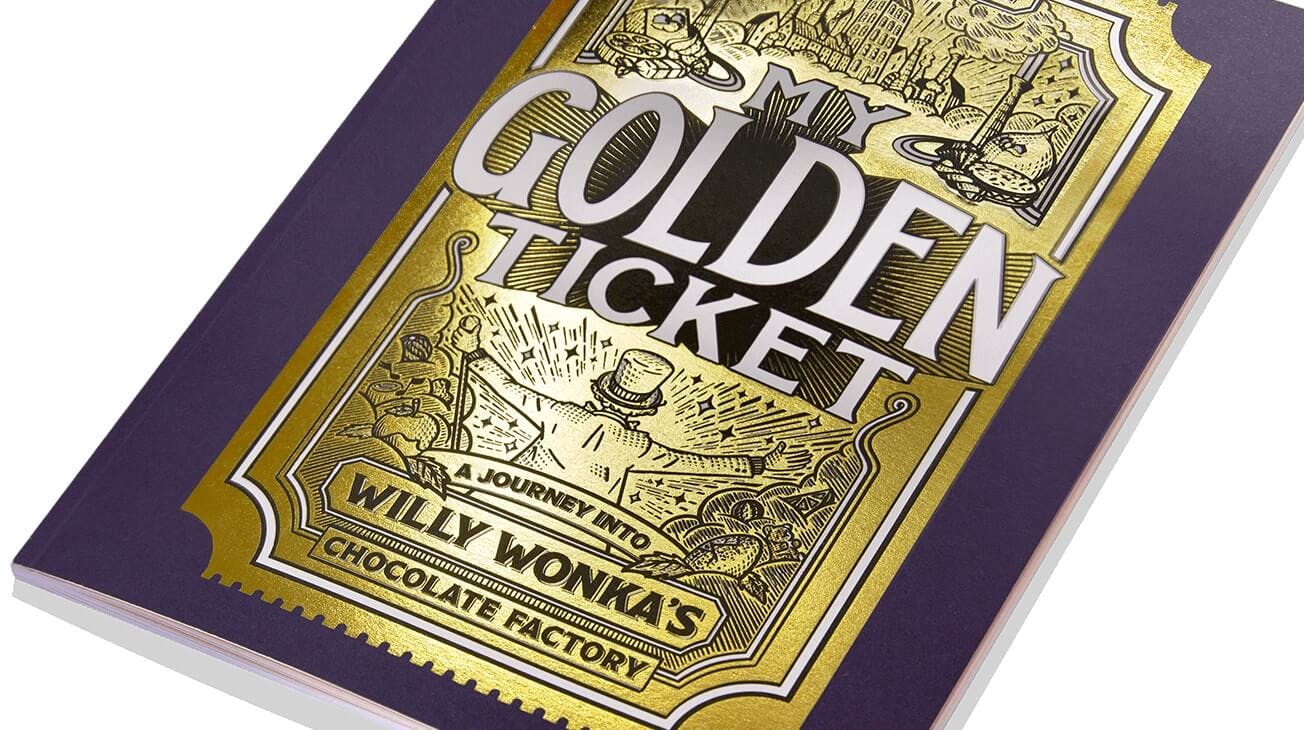 A close up shot of My Golden Ticket book with the golden ticket on the cover